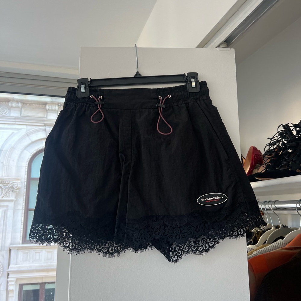 Super cute black nylon shorts w lace detail